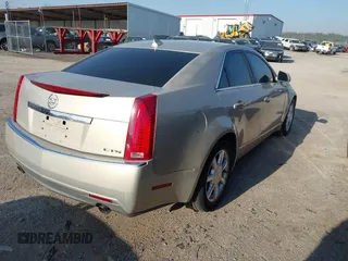 2009 Cadillac CTS RWD w/1SA with VIN 1G6DF577990141214, listed as a IAAI auction lot 42014205 with 237,986 mi miles. Bid and sale history available at carsss.com. Image 4.