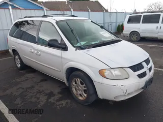 2003 Dodge Caravan Sport with VIN 2D4GP44L43R236945, listed as a IAAI auction lot 41798386 with 143,904 mi miles. Bid and sale history available at carsss.com. Image 1.