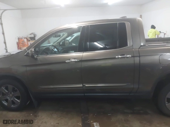 2020 Honda Ridgeline RTL-E with VIN 5FPYK3F75LB001516, listed as a IAAI auction lot 41605859 with 93,902 mi miles. Bid and sale history available at carsss.com. Image 14.