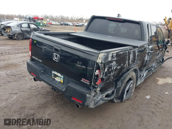 2022 Honda Ridgeline Sport with VIN 5FPYK3F15NB010408, listed as a IAAI auction lot 41538181 with 87,923 mi miles and . Bid and sale history available at DreamBid. Image 4.