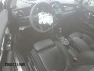 2023 MINI Hardtop Cooper SE z VIN WMW13DJ01P2U19472, wystawiony jako Copart lot #59630715 z przebiegiem 7 304 mil mil oraz Szkoda całkowita • Salvage title. Historia ofert i sprzedaży dostępna na DreamBid. Obrazek 8.