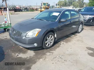 2006 Nissan Maxima SE z VIN 1N4BA41E96C859768, wystawiony jako IAAI lot #42474743 z przebiegiem 119 289 mil mil oraz . Historia ofert i sprzedaży dostępna na DreamBid. Obrazek 2.