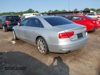 2013 Audi A8 3.0L с VIN WAURGAFD7DN016351, выставлен на аукционе IAAI как лот 42372202 с пробегом 90 753 миль миль и . История ставок и продаж доступна на DreamBid. Изображение 3.