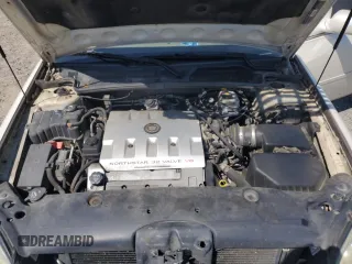 2003 Cadillac DeVille z VIN 1G6KD54Y93U258835, wystawiony jako Copart lot #52595785 z przebiegiem 215 289 mil mil oraz Szkody całkowita. Historia ofert i sprzedaży dostępna na DreamBid. Obrazek 12.