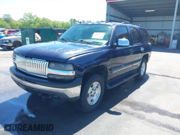 2004 Chevrolet Tahoe LT with VIN 1GNEC13Z44J125913, listed as a IAAI auction lot 42027889 with 205,796 mi miles. Bid and sale history available at carsss.com. Image 2.