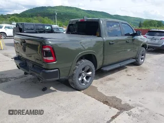 2021 Ram 1500 Big Horn with VIN 1C6SRFFT1MN669218, listed as a IAAI auction lot 42366224 with 50,230 mi miles and . Bid and sale history available at DreamBid. Image 4.