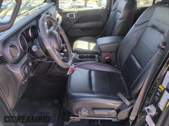 2023 Jeep Wrangler Sahara with VIN 1C4JJXP65PW661194, listed as a Copart auction lot 55729925 with 24,264 mi miles and Clean Title. Bid and sale history available at DreamBid. Image 7.