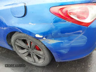 2011 Hyundai Genesis Coupe z VIN KMHHT6KD4BU060514, wystawiony jako IAAI lot #42660478 z przebiegiem 129 800 mil mil oraz . Historia ofert i sprzedaży dostępna na DreamBid. Obrazek 14.