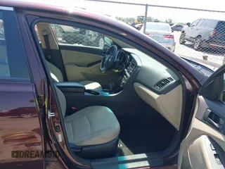 2014 Kia Optima LX with VIN 5XXGM4A70EG273483, listed as a IAAI auction lot 42402765 with 129,770 mi miles and . Bid and sale history available at DreamBid. Image 5.