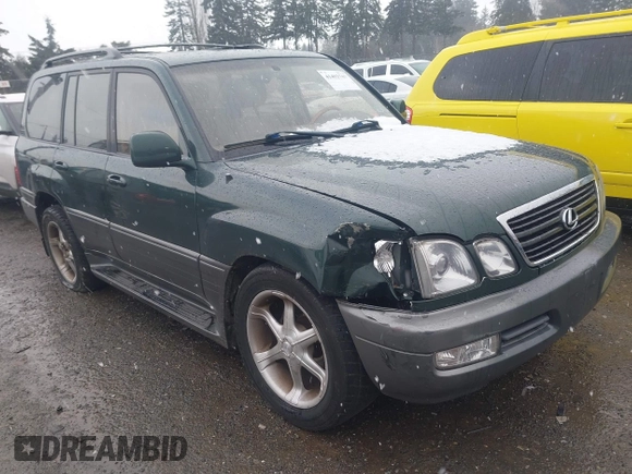 2000 Lexus LX with VIN JT6HT00W3Y0124104, listed as a IAAI auction lot 41493749 with 253,161 mi miles. Bid and sale history available at carsss.com. Image 1.