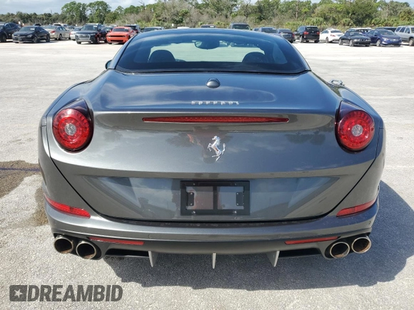 2015 Ferrari California T с VIN ZFF77XJA3F0206563, выставлен на аукционе Copart как лот 73751534 с пробегом Не указан миль и Списание • Salvage title. История ставок и продаж доступна на DreamBid. Изображение 6.