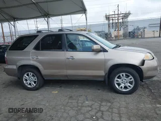 2004 Acura MDX Touring Pkg RES w/Nav with VIN 2HNYD18944H529592, listed as a IAAI auction lot 41922111 with 273,869 mi miles. Bid and sale history available at carsss.com. Image 13.