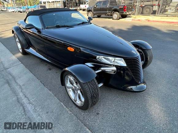 2000 Plymouth Prowler z VIN 1P3EW65G6YV602347, wystawiony jako Copart lot #71067714 z przebiegiem 65 554 mil mil oraz Tytuł czysty. Historia ofert i sprzedaży dostępna na DreamBid. Obrazek 4.