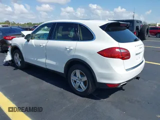 2014 Porsche Cayenne with VIN WP1AA2A20ELA02638, listed as a IAAI auction lot 42349570 with 113,355 mi miles and . Bid and sale history available at DreamBid. Image 3.