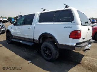 2001 Ford F-150 SuperCrew XLT with VIN 1FTRW08L31KF24186, listed as a Copart auction lot 65188904 with 0 mi miles and Salvage Title. Bid and sale history available at carsss.com. Image 2.