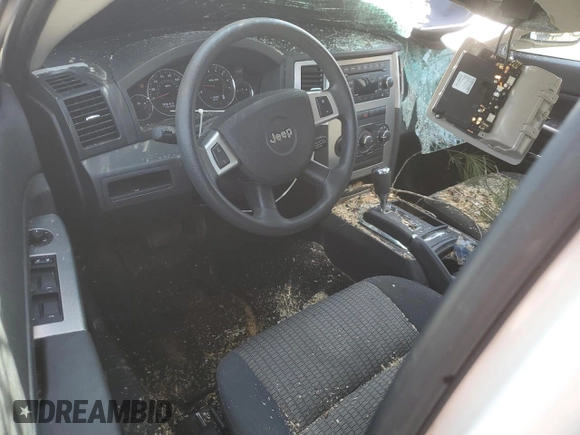 2010 Jeep Grand Cherokee Laredo with VIN 1J4PR4GK1AC100542, listed as a Copart auction lot 46047325 with 146,499 mi miles and Salvage Title. Bid and sale history available at carsss.com. Image 8.