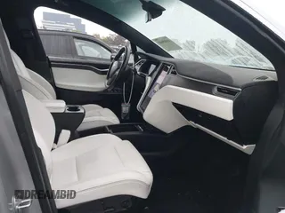 2016 Tesla Model X P90D with VIN 5YJXCBE41GF006284, listed as a IAAI auction lot 41809683 with 71,135 mi miles. Bid and sale history available at carsss.com. Image 5.