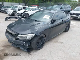 2015 BMW 2 Series M235i with VIN WBA1J7C5XFV289284, listed as a IAAI auction lot 42626668 with 179,944 mi miles and . Bid and sale history available at DreamBid. Image 2.
