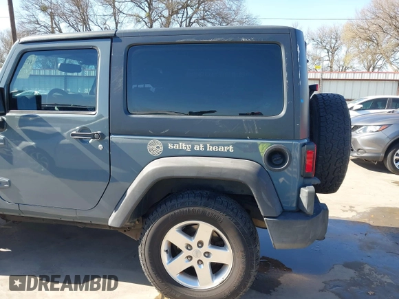 2014 Jeep Wrangler Sport with VIN 1C4AJWAGXEL177449, listed as a IAAI auction lot 41741519 with 117,056 mi miles and . Bid and sale history available at carsss.com. Image 18.