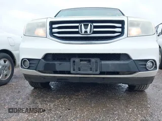 2015 Honda Pilot EX-L with VIN 5FNYF4H56FB061663, listed as a IAAI auction lot 41873152 with 211,876 mi miles and . Bid and sale history available at carsss.com. Image 17.