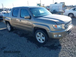 2009 Honda Ridgeline RTL with VIN 2HJYK16529H500753, listed as a IAAI auction lot 41687342 with 216,499 mi miles. Bid and sale history available at carsss.com. Image 1.