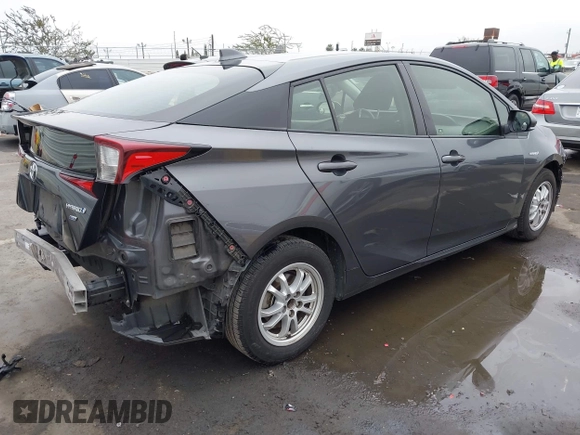 2021 Toyota Prius L Eco with VIN JTDKAMFU8M3144391, listed as a IAAI auction lot 42477718 with 314,346 mi miles and . Bid and sale history available at DreamBid. Image 4.