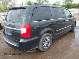 2014 Chrysler Town & Country Touring L with VIN 2C4RC1CG5ER378194, listed as a IAAI auction lot 42176454 with 178,448 mi miles and . Bid and sale history available at carsss.com. Image 4.