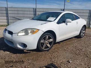 2008 Mitsubishi Eclipse GS z VIN 4A3AK24F28E007617, wystawiony jako IAAI lot #41877110 z przebiegiem 193 999 mil mil oraz . Historia ofert i sprzedaży dostępna na DreamBid. Obrazek 2.