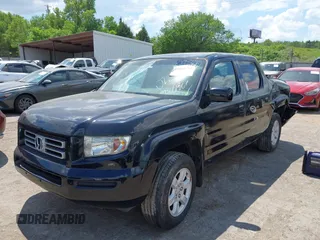 2006 Honda Ridgeline RTL z VIN 2HJYK16596H573159, wystawiony jako IAAI lot #42210214 z przebiegiem 318 126 mil mil oraz . Historia ofert i sprzedaży dostępna na DreamBid. Obrazek 2.