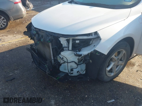 2018 Chevrolet Malibu LS with VIN 1G1ZB5ST5JF101063, listed as a IAAI auction lot 41854886 with 92,707 mi miles and . Bid and sale history available at DreamBid. Image 6.