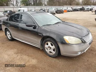2002 Nissan Altima SE with VIN 1N4BL11D52C260747, listed as a IAAI auction lot 41733376 with 151,750 mi miles. Bid and sale history available at carsss.com. Image 1.