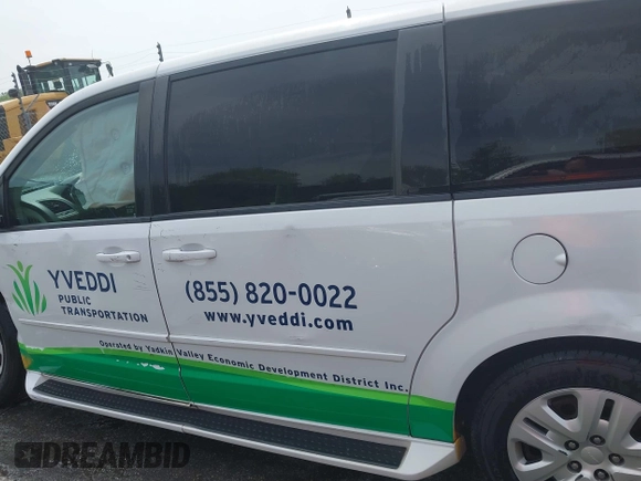 2014 Dodge Grand Caravan American Value with VIN 2C4RDGBG6ER380568, listed as a IAAI auction lot 41683180 with 303,612 mi miles and . Bid and sale history available at DreamBid. Image 14.