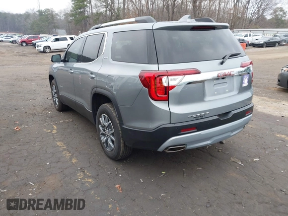 2023 GMC Acadia SLT with VIN 1GKKNML48PZ156202, listed as a IAAI auction lot 41526629 with 29,460 mi miles and . Bid and sale history available at DreamBid. Image 3.