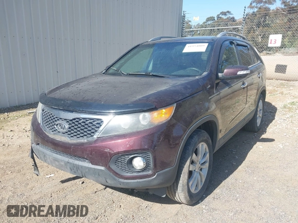 2011 Kia Sorento EX with VIN 5XYKU4A20BG001554, listed as a IAAI auction lot 41954009 with 119,323 mi miles. Bid and sale history available at carsss.com. Image 2.