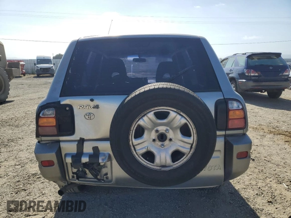 2000 Toyota RAV4 with VIN JT3GP10V2Y0052306, listed as a Copart auction lot 54726325 with 244,910 mi miles and Salvage title. Bid and sale history available at DreamBid. Image 6.