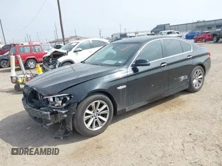 2015 BMW 5 Series 528i with VIN WBA5A5C58FD520694, listed as a IAAI auction lot 41804906 with 121,636 mi miles. Bid and sale history available at carsss.com. Image 2.