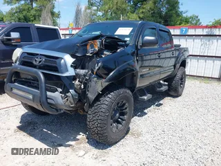 2015 Toyota Tacoma with VIN 5TFLU4EN9FX143428, listed as a IAAI auction lot 42173370 with 200,447 mi miles and . Bid and sale history available at DreamBid. Image 17.
