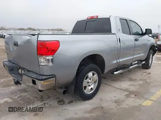 2012 Toyota Tundra z VIN 5TFRY5F18CX121917, wystawiony jako IAAI lot #41475681 z przebiegiem 166 507 mil mil oraz . Historia ofert i sprzedaży dostępna na DreamBid. Obrazek 4.