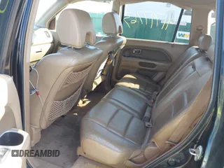 2006 Honda Pilot EX-L with VIN 5FNYF18766B008879, listed as a IAAI auction lot 41797763 with 398,242 mi miles and . Bid and sale history available at DreamBid. Image 8.