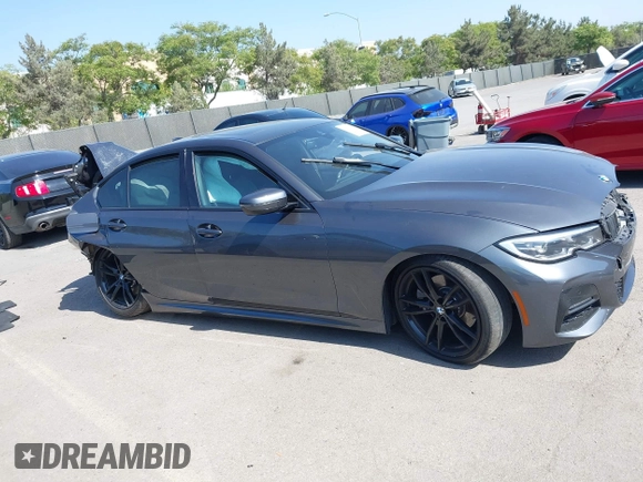 2021 BMW 3 Series 330i с VIN 3MW5R1J03M8B96458, выставлен на аукционе IAAI как лот 42355921 с пробегом Не указан миль и . История ставок и продаж доступна на DreamBid. Изображение 14.