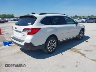 2018 Subaru Outback Touring with VIN 4S4BSATC5J3336205, listed as a IAAI auction lot 42201530 with 103,362 mi miles and . Bid and sale history available at DreamBid. Image 4.