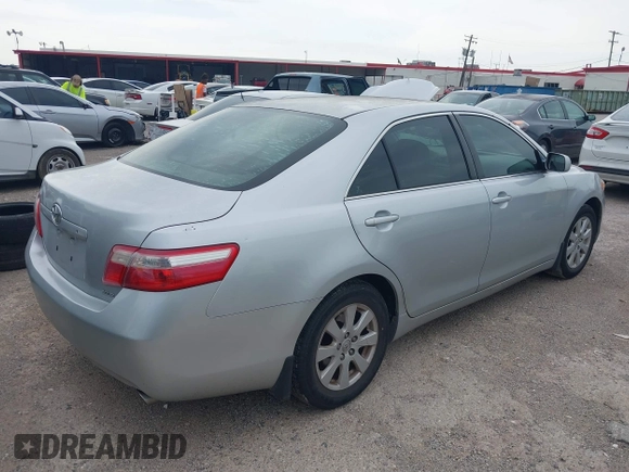 2007 Toyota Camry CE with VIN 4T1BE46K97U571446, listed as a IAAI auction lot 42195858 with 222,159 mi miles and . Bid and sale history available at DreamBid. Image 4.