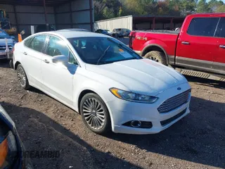 2016 Ford Fusion Titanium with VIN 3FA6P0K98GR150939, listed as a IAAI auction lot 40994523 with 144,051 mi miles. Bid and sale history available at carsss.com. Image 1.