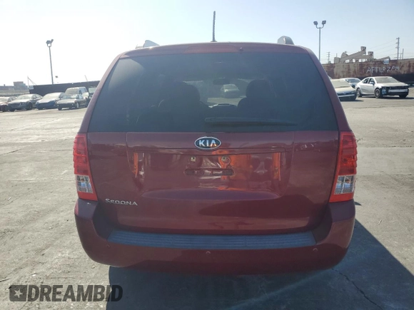 2011 Kia Sedona LX with VIN KNDMG4C75B6410550, listed as a Copart auction lot 76997744 with 74,659 mi miles and Salvage Title. Bid and sale history available at carsss.com. Image 6.