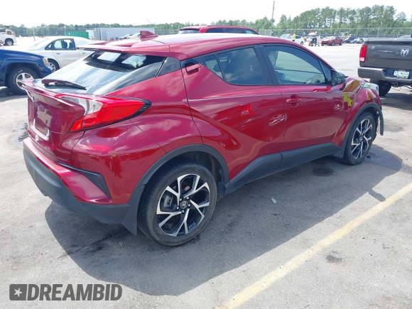 2018 Toyota C-HR XLE with VIN NMTKHMBX5JR013469, listed as a IAAI auction lot 42356609 with 32,051 mi miles and . Bid and sale history available at DreamBid. Image 4.
