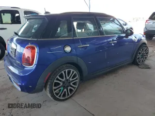 2019 MINI Hardtop 4 Door Cooper S z VIN WMWXU3C58K2H55626, wystawiony jako Copart lot #54404175 z przebiegiem 65 209 mil mil oraz Szkoda całkowita • Salvage title. Historia ofert i sprzedaży dostępna na DreamBid. Obrazek 3.
