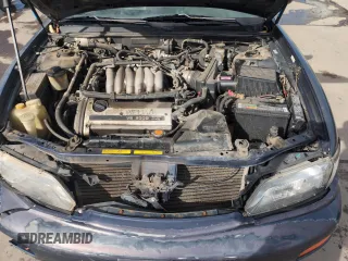 1997 Nissan Maxima GXE with VIN JN1CA21D0VT201140, listed as a Copart auction lot 52230495 with 286,440 mi miles and Clean title. Bid and sale history available at DreamBid. Image 11.