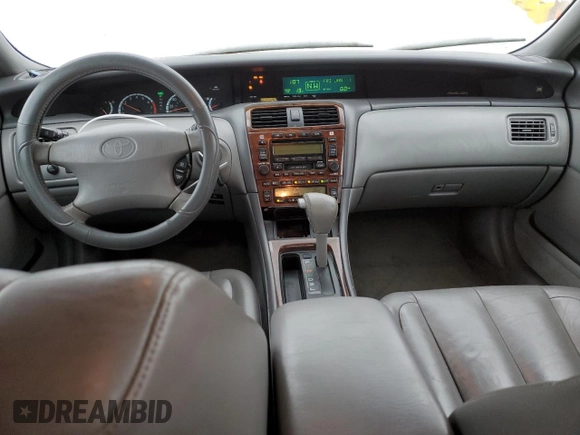 2001 Toyota Avalon XL z VIN 4T1BF28B01U138751, wystawiony jako Copart lot #44849165 z przebiegiem 225 082 mil mil oraz Tytuł czysty. Historia ofert i sprzedaży dostępna na DreamBid. Obrazek 8.
