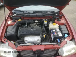 1999 Daewoo Nubira CDX z VIN KLAJB52Z5XK256700, wystawiony jako Copart lot #75085934 z przebiegiem Nie podano mil oraz Szkody całkowita. Historia ofert i sprzedaży dostępna na DreamBid. Obrazek 11.