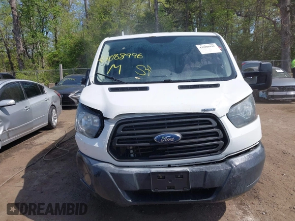 2015 Ford Transit with VIN 1FTNE2YM7FKB00894, listed as a IAAI auction lot 42088996 with 199,321 mi miles and . Bid and sale history available at DreamBid. Image 12.